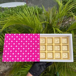 12-Piece Chocolate Box with Vibrant Pink Geometric Sleeve & Golden Cavity Tray   Color: Hot Pink & Soft Pink Geometric Grid Pattern with Metallic Gold Inner Tray
