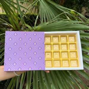 16-Piece Chocolate Box with Lavender Geometric Lattice Sleeve & Golden Cavity Tray   Color: Soft Purple & Lavender Geometric Lattice Pattern with Metallic Gold Inner Tray