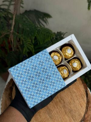4-Piece Chocolate Box with Blue Floral Patterned Sleeve Color: Royal Blue & Pastel Sky Blue Floral Pattern
