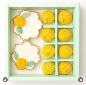 2 URLI CANDLE + 8  LADOO CANDLE